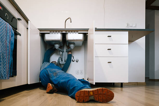 Professional Emergency Plumber technician working in Osteen, FL